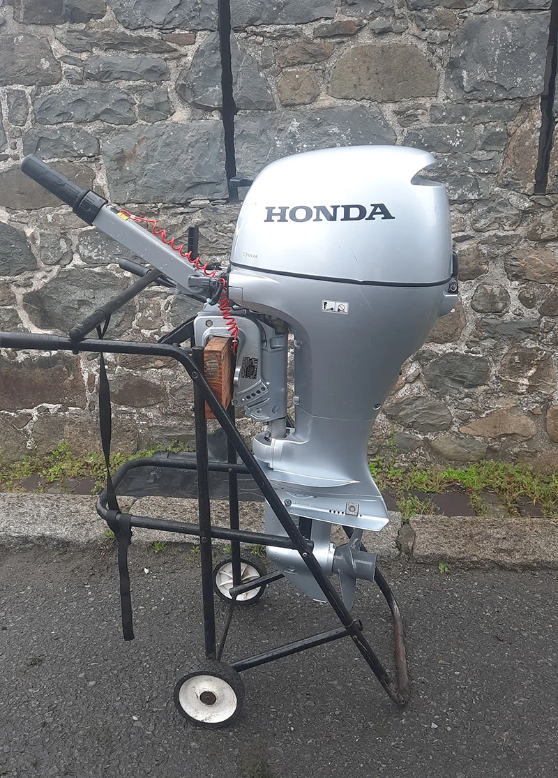 Used 10hp honda fourstroke, pull start on tiller, short shaft